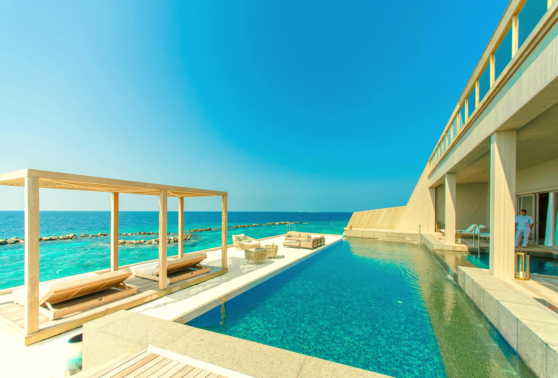 Tropical resort-style custom pool in Magnolia, TX by Creative Lifestyle Pools